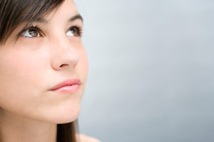 Teen in deep thought - Pregnancy Help in Arizona
