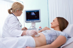 Woman getting a sonogram